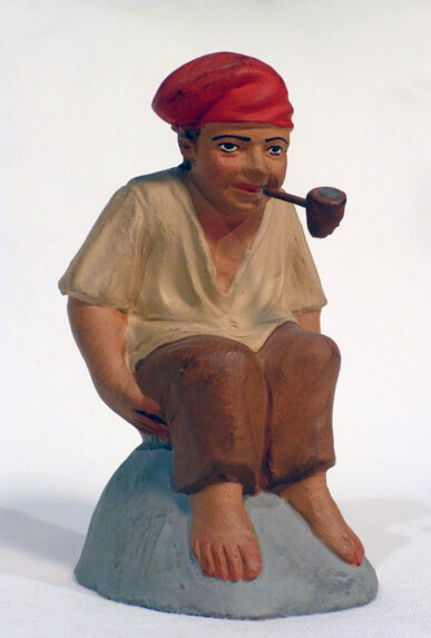 Caganer fumant amb pipa